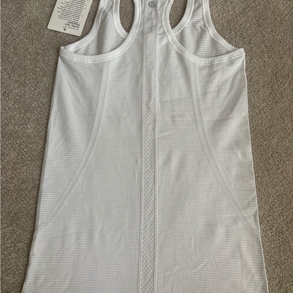 Lululemon Swiftly Tech Racerback white
Size 4
White
NWT - Picture 3 of 4